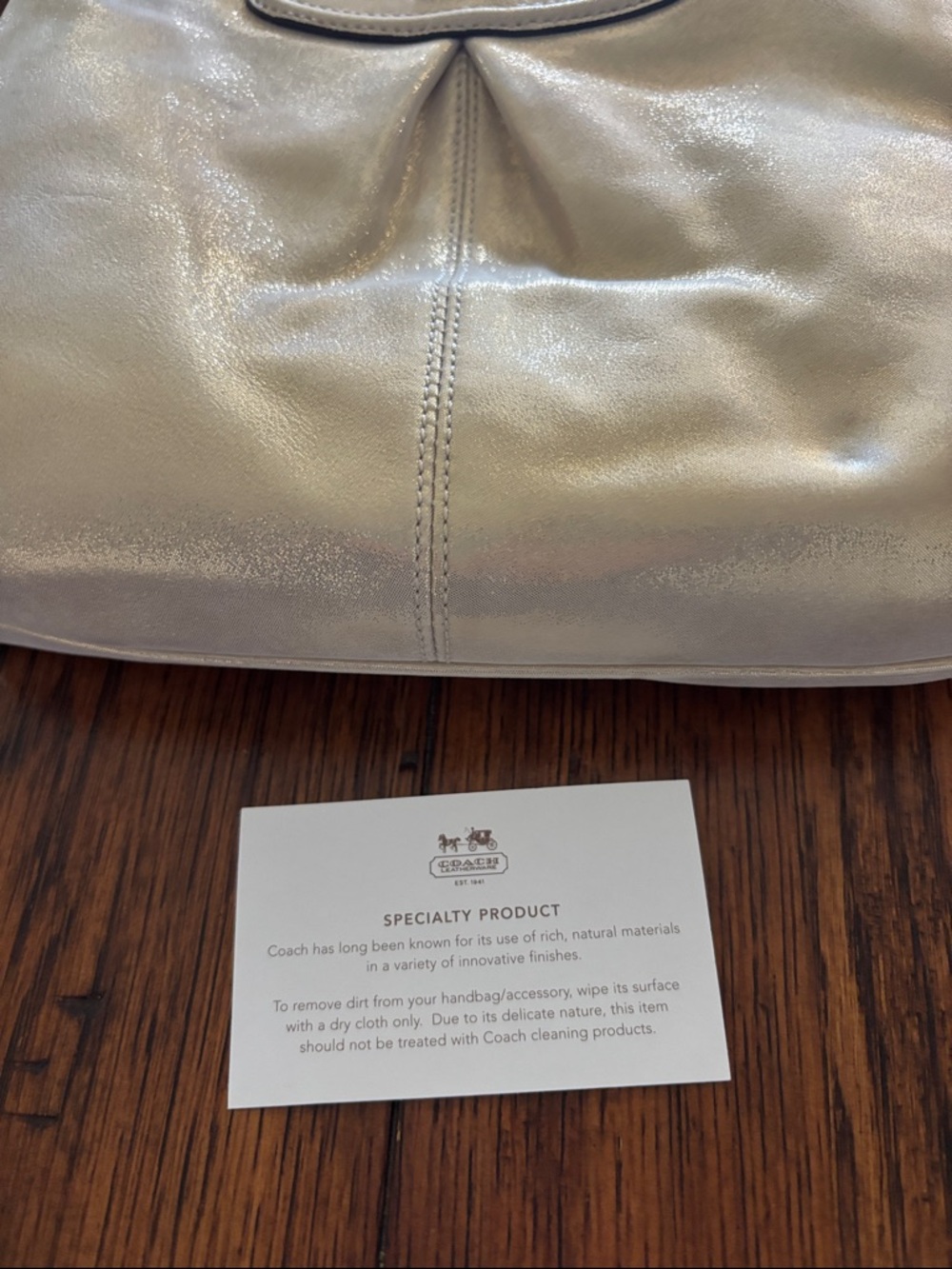 Coach Metallic Champagne Pebble Leather Crossbody
1 small indent from storing. - Picture 4 of 4